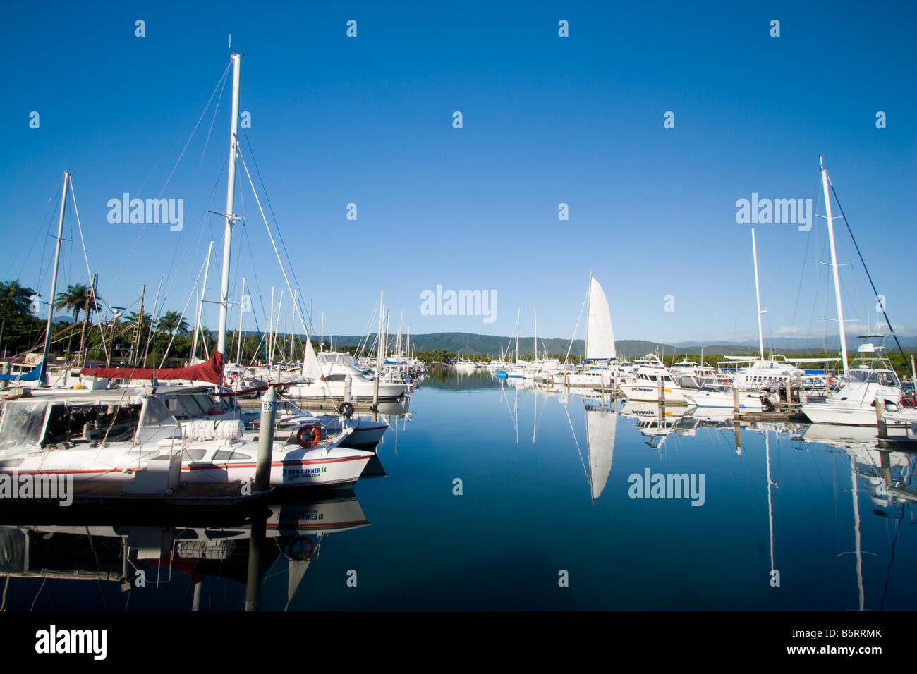 Luxurious private yachts moored at the Port Douglas marina, Queensland, Australia Stock Photo