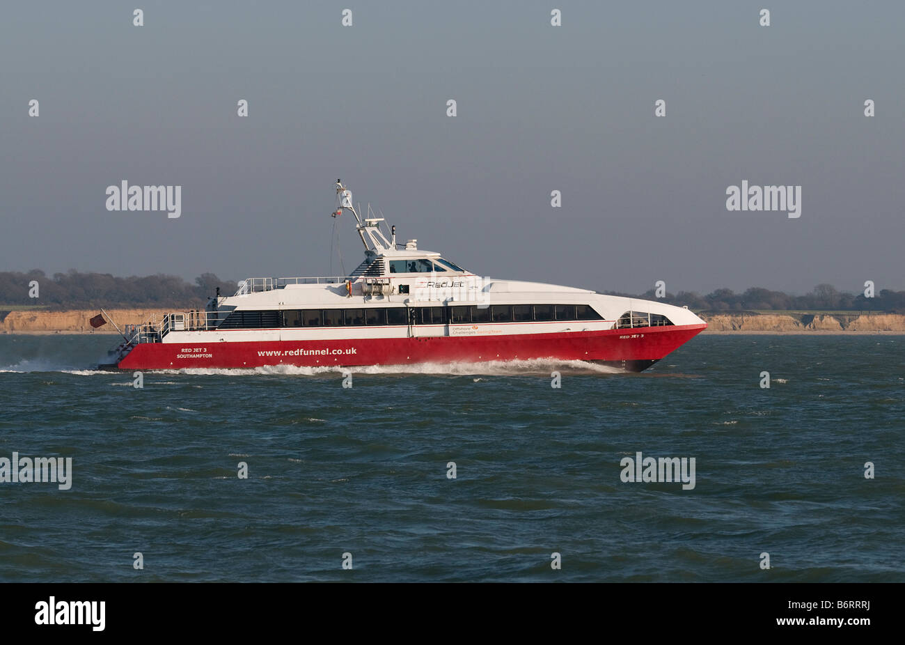 Red Funnel s Red Jet 3 catamaran in the Solent Stock Photo