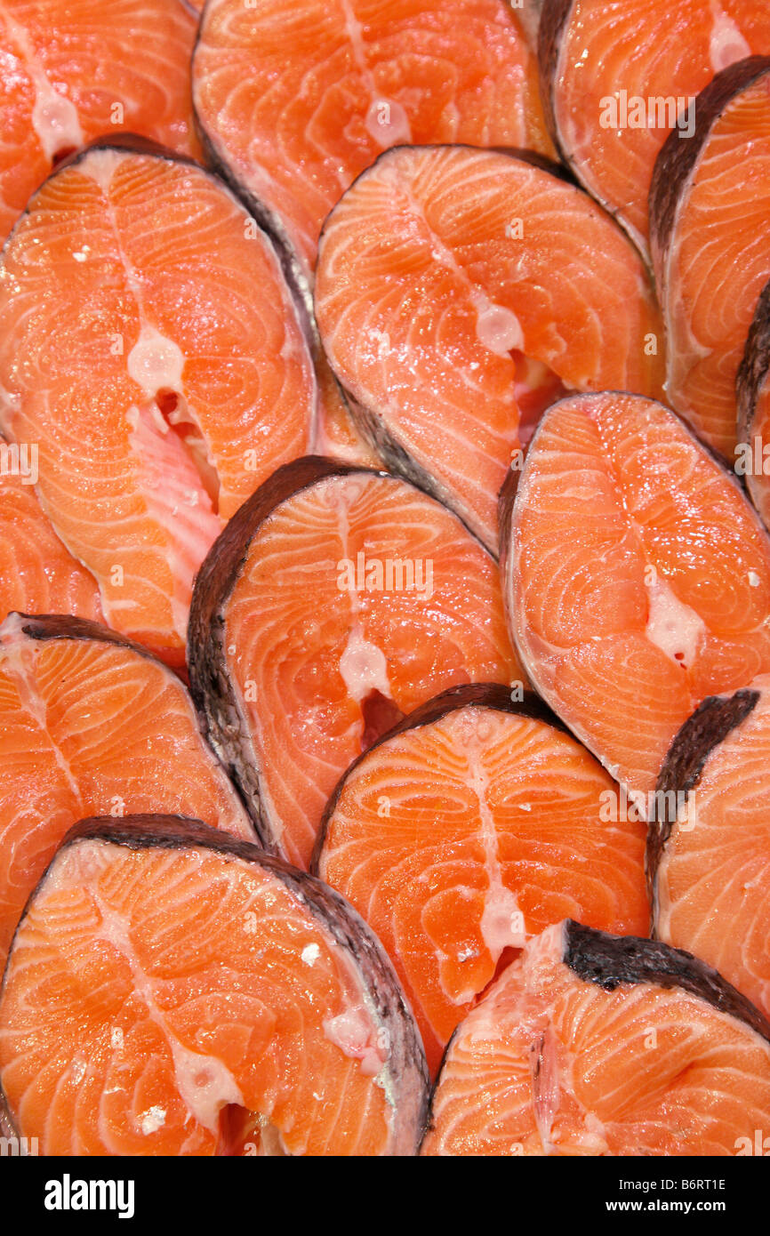 fresh fish on ice in a supermarket; fillets of salmon Stock Photo Alamy