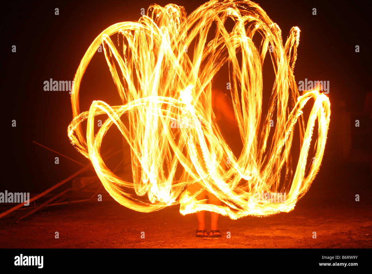 Fire poi at a beach party in Goa, India Stock Photo