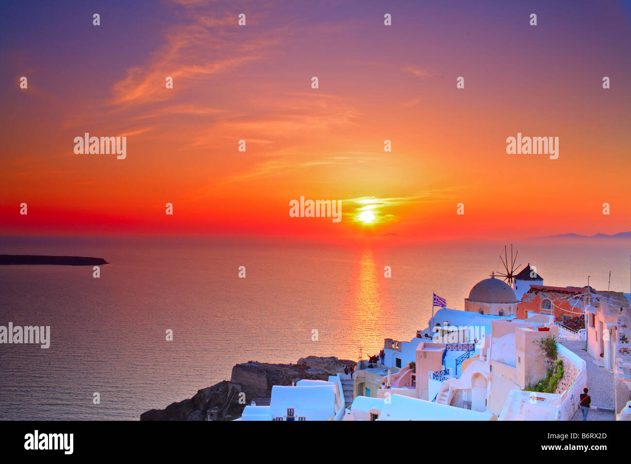 Sunset in Oia village on Santorini island Stock Photo