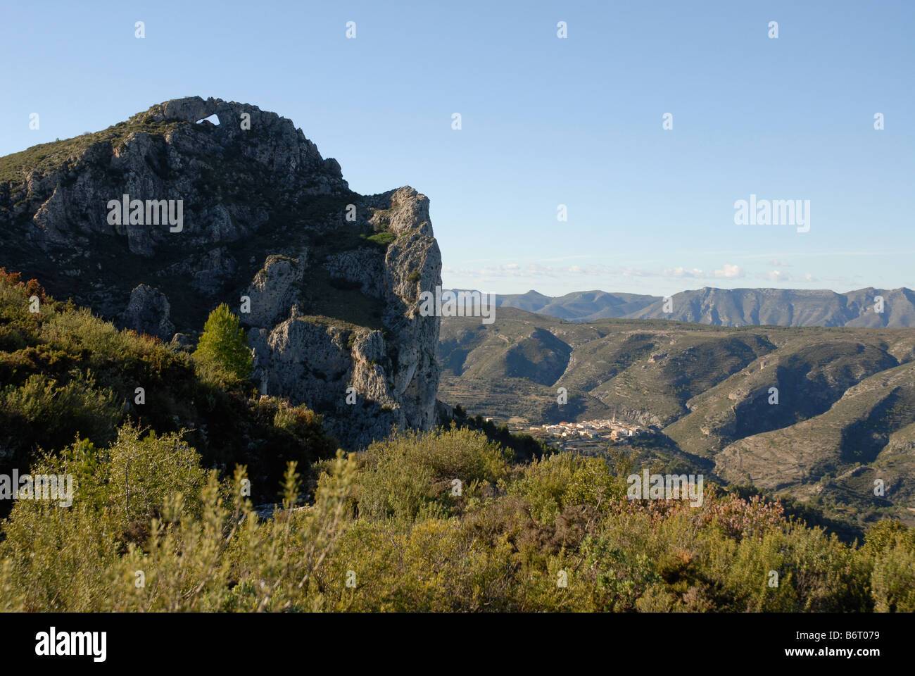 view to Forada Rock Arch & Vall de Gallinera from Sierra de la Forada, Alicante Province, Comunidad Valenciana, Spain Stock Photo
