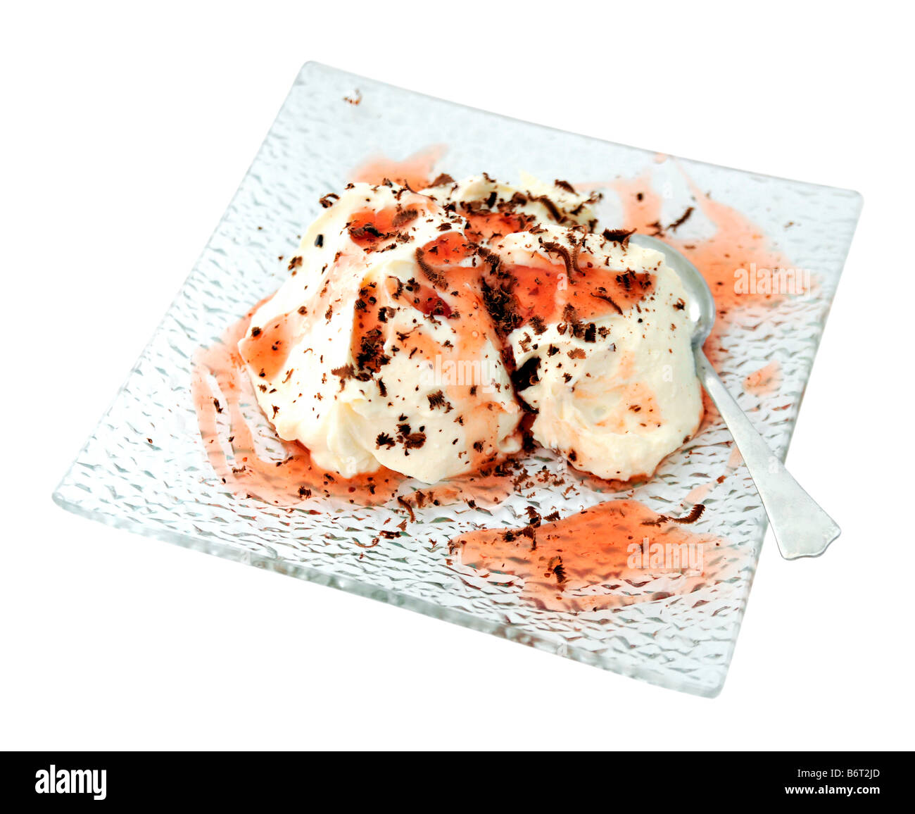 Sweet cream ice cream with chocolate chips and strawberry sauce Stock