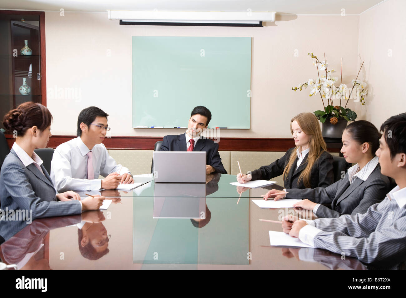 Business people having meeting in the office Stock Photo - Alamy