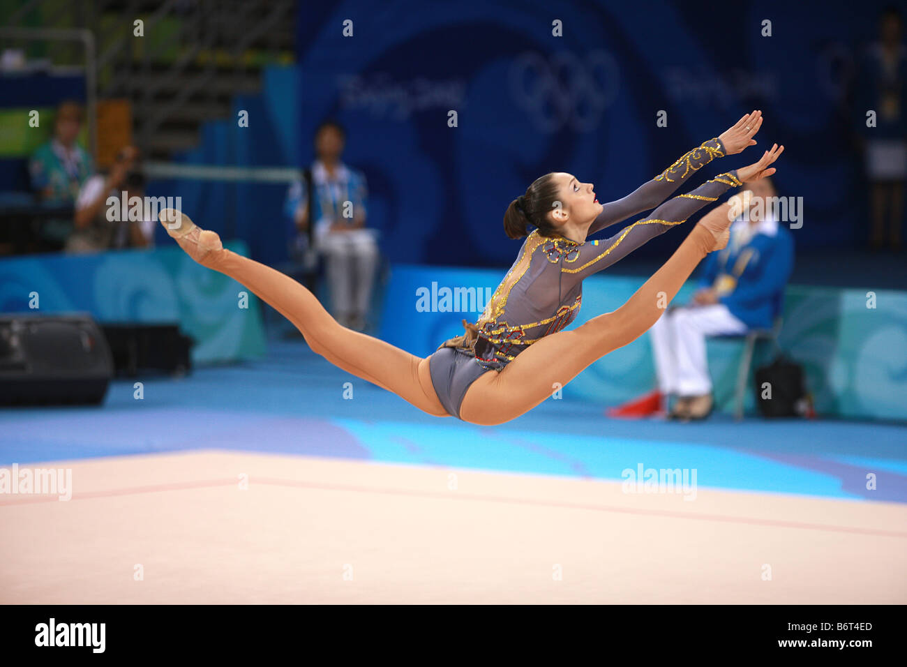 Aug 23, 2008; Beijing, China; Rhythmic gymnast Anna Bessonova (Ukraine) leaps with clubs to win bronze medal at 2008 Olympics. Stock Photo