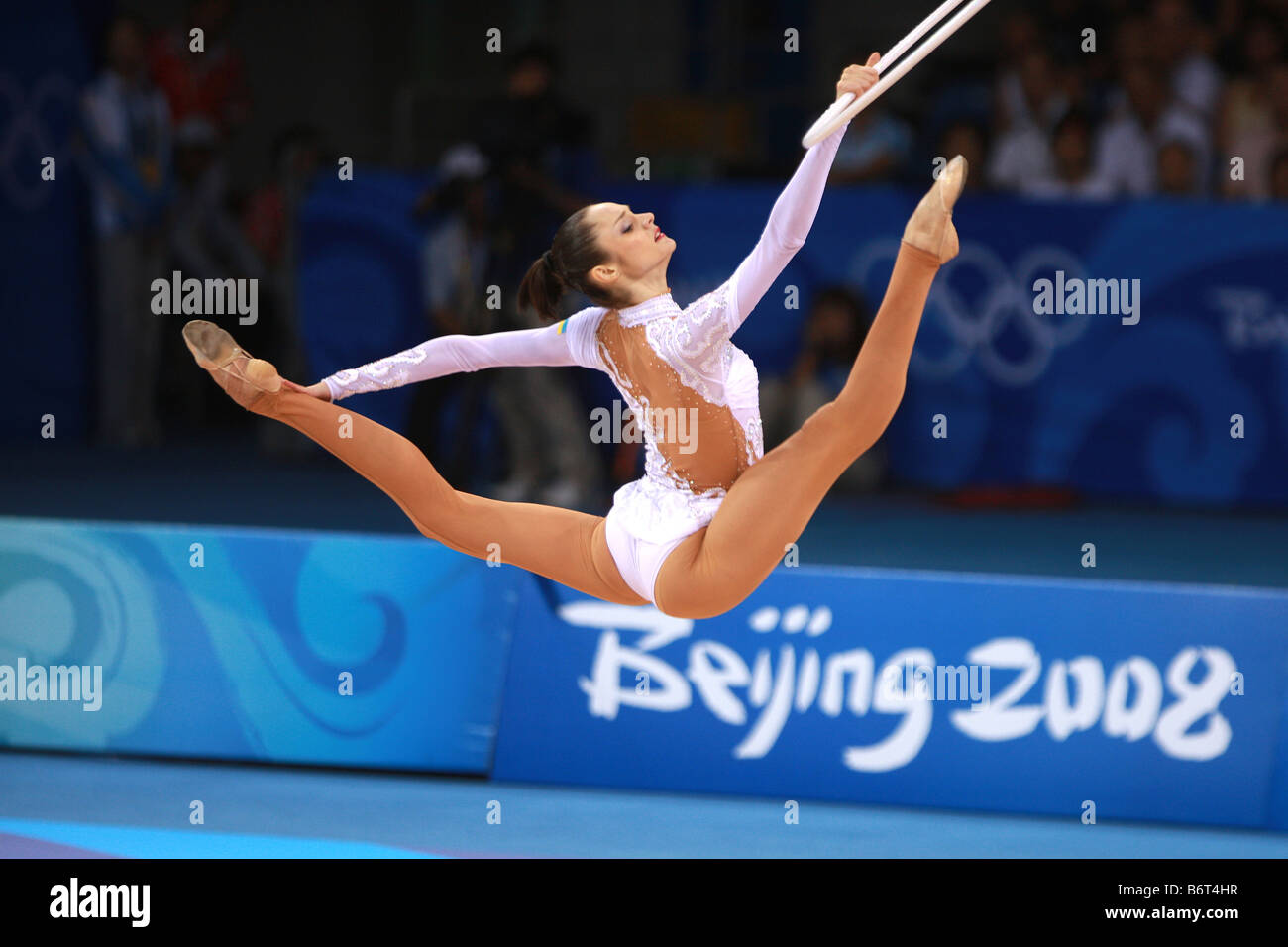 Aug 23, 2008; Beijing, China; Rhythmic gymnast Anna Bessonova (Ukraine) leaps with hoop to win bronze medal at 2008 Olympics. Stock Photo