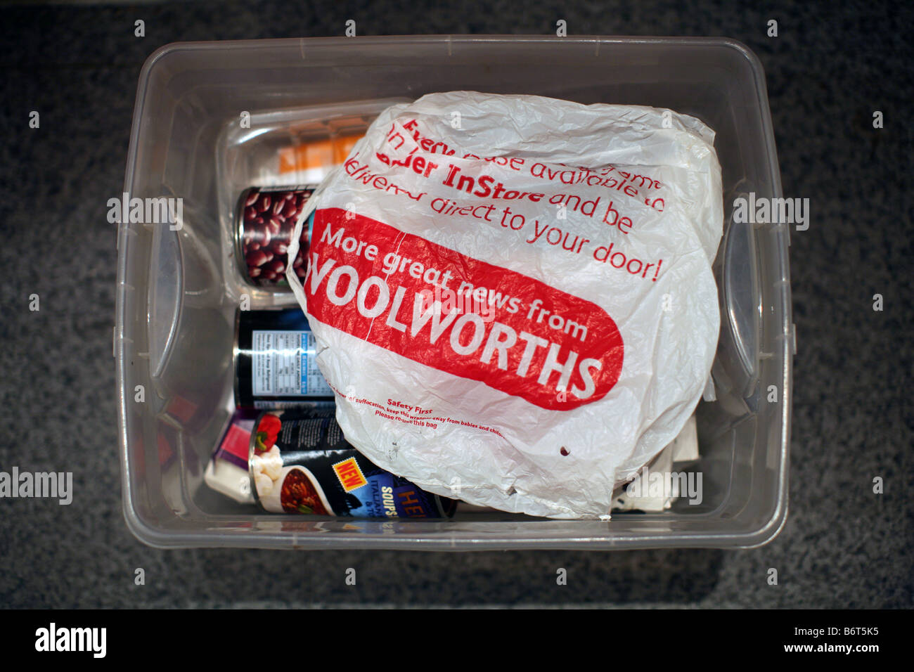 Woolworths carrier bag in kitchen recycling box Stock Photo Alamy