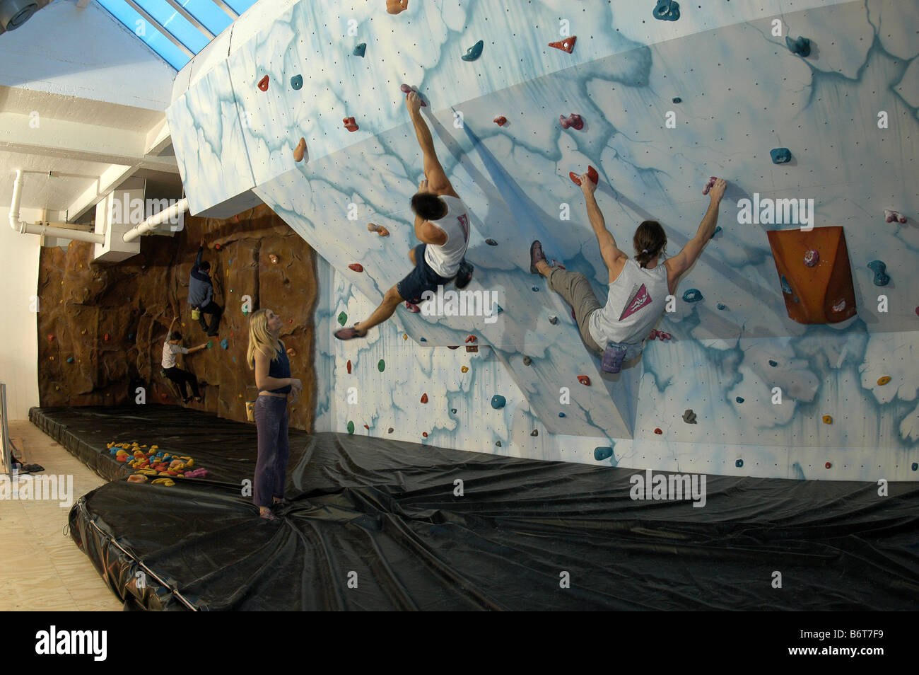 Climbers training on indoor climbing wall Stock Photo Alamy