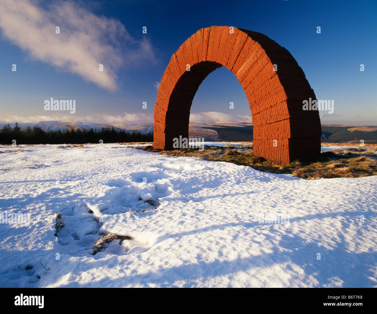 Striding Arches in landscape by enviromental artist Andy Goldsworthy an arch sculpture on Colt Hill Glenhead Scotland UK Stock Photo