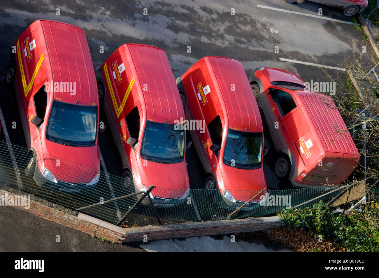 Royal Mail delivery vans parked at a sorting office Stock Photo