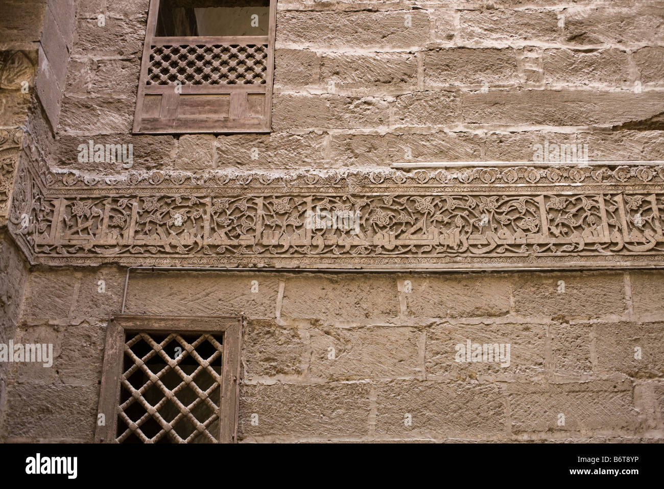 inscription of architectural supervisor, Muhsin al-Bilsini, on Kufic inscription in Shafi'i madrasa, Sultan Hasan complex, Cairo Stock Photo