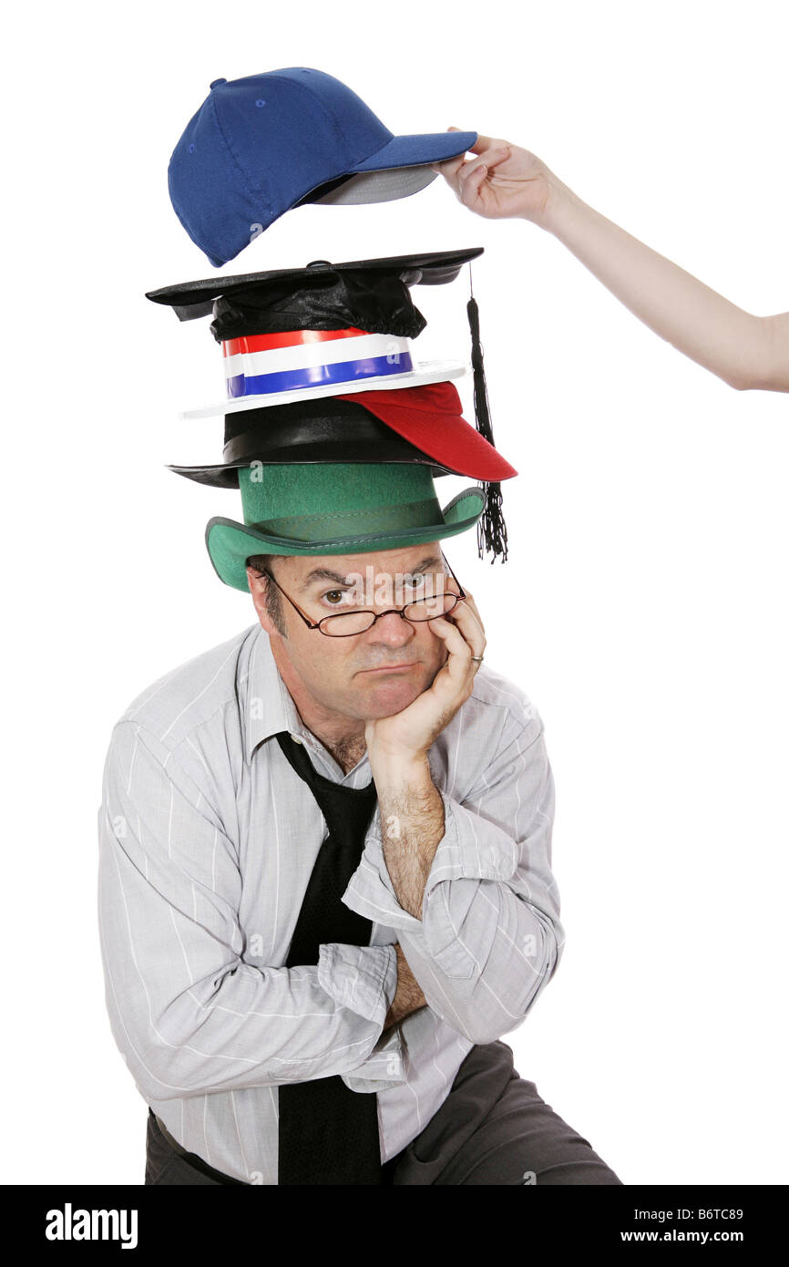 Overburdened worker wearing too many hats and someone is adding one