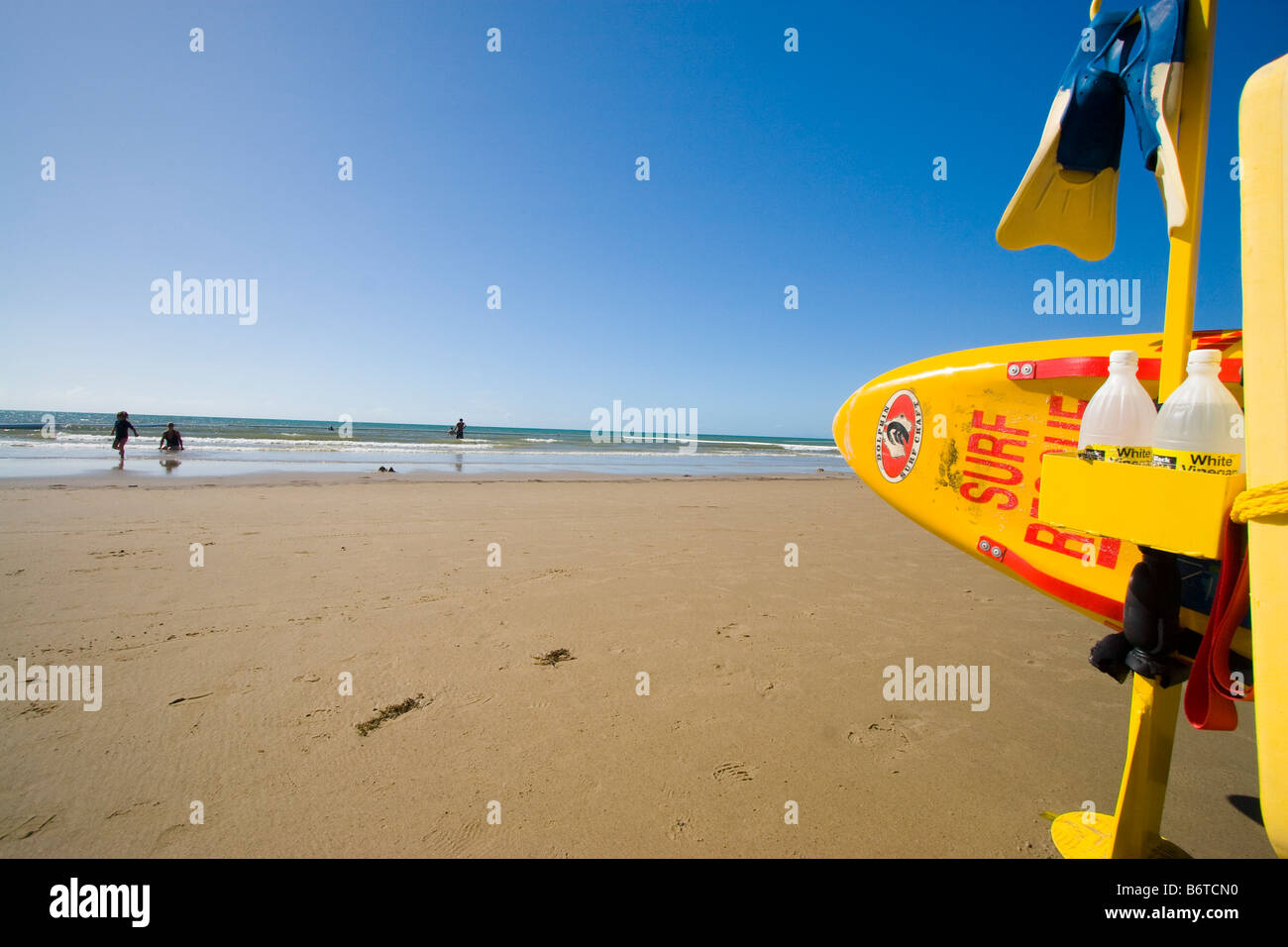 The iconic yellow surf ski is a well-known symbol of Australia's surf lifesavers. Port Douglas, Queensland, Australia Stock Photo