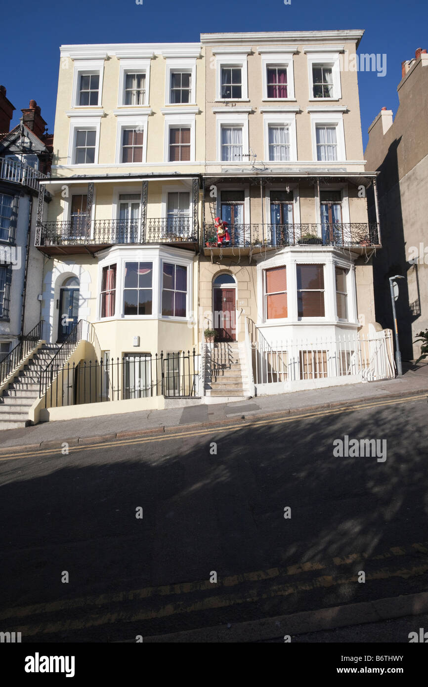 Father Christmas Climbs a Balcony, pair of houses in Albion