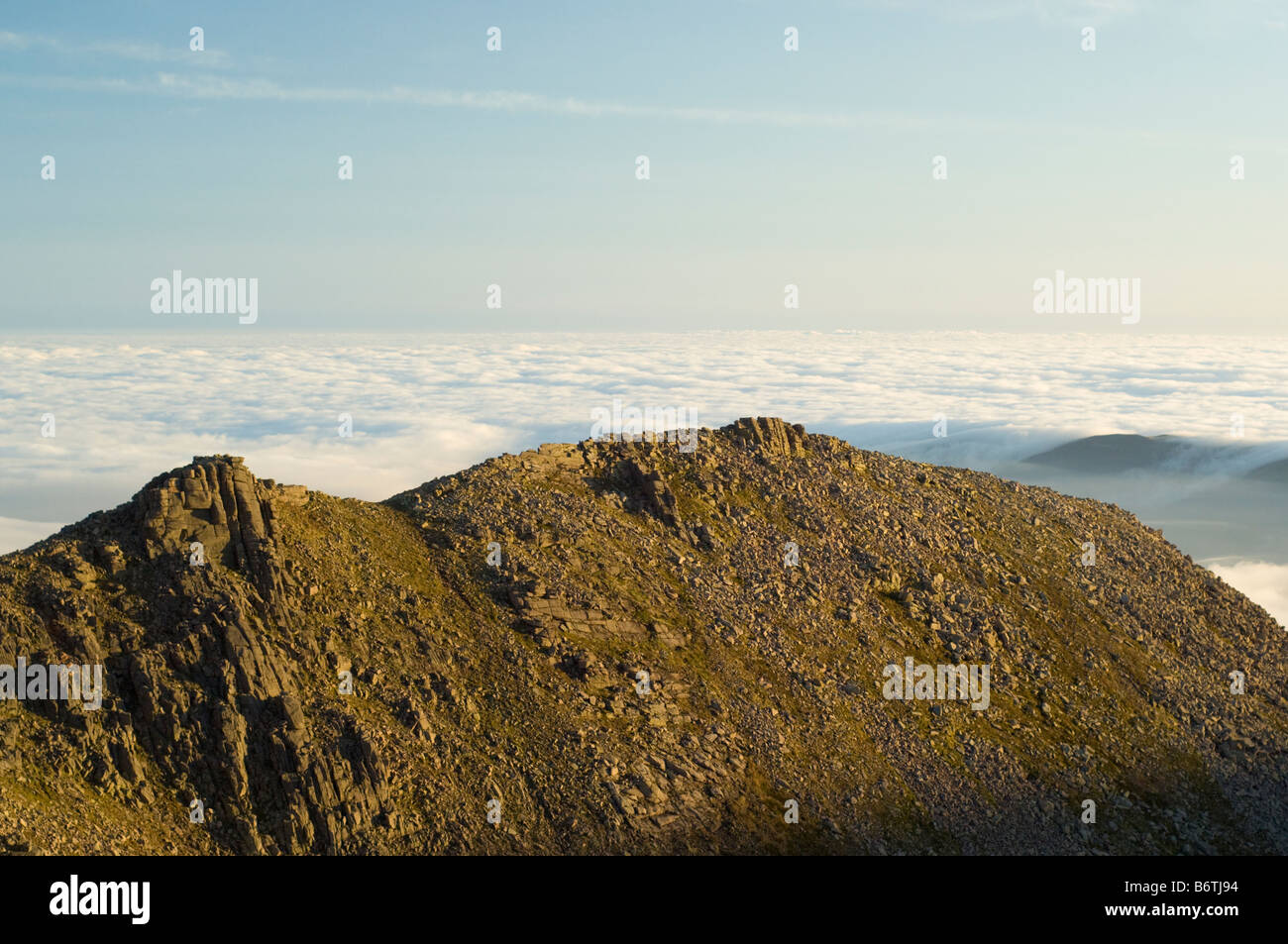 Inversion fog, or low cloud, over Glen More in the Cairngorms, viewed across granite cliffs of the Fiacaill Ridge. Stock Photo