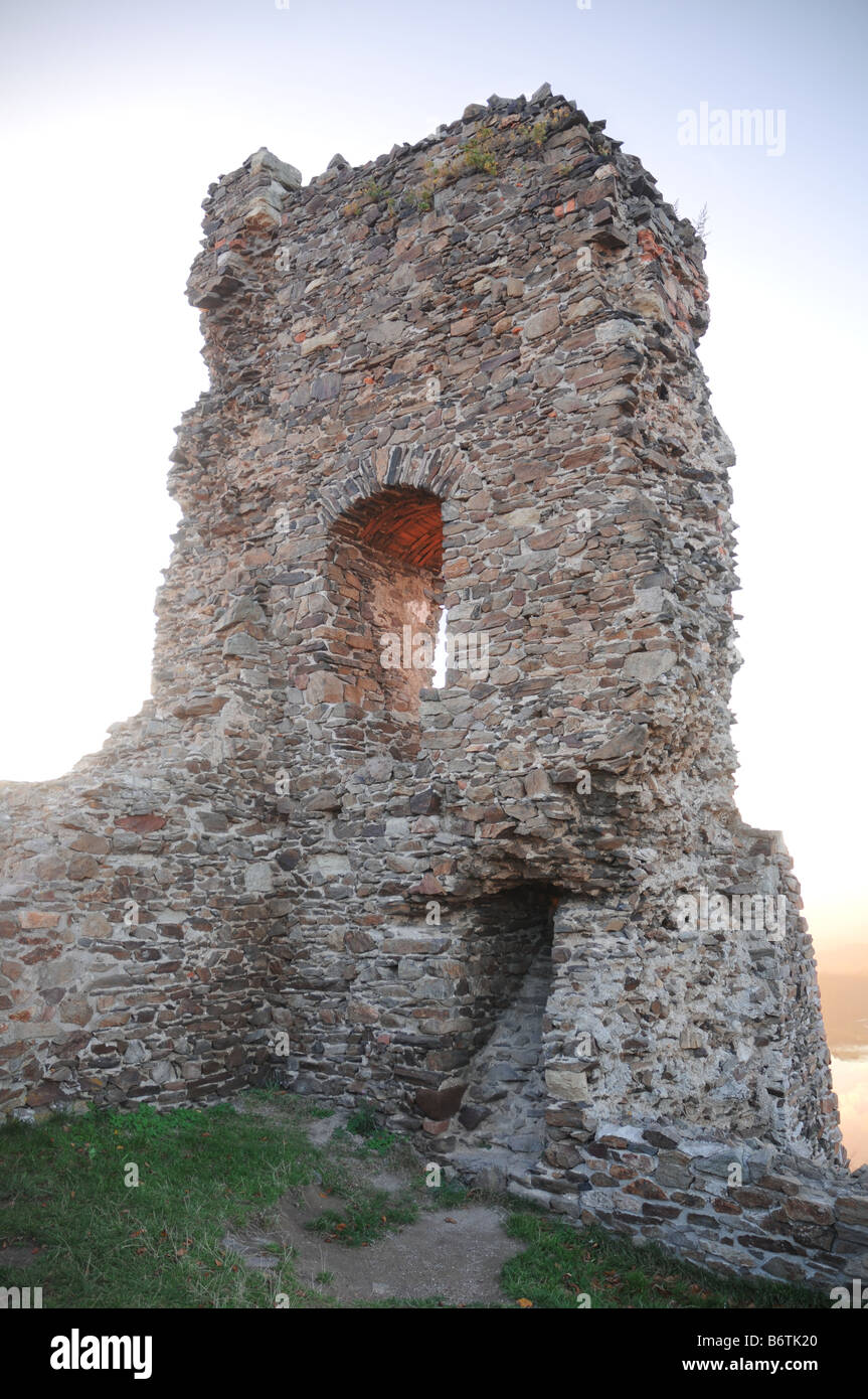 Remains of Lichnice castle in the light of the setting sun. Stock Photo