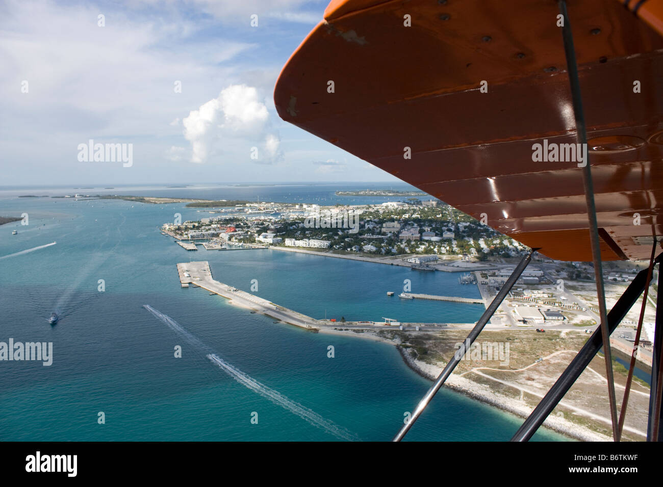 Flying over the Florida Keys in an open cockpit air plane Stock Photo