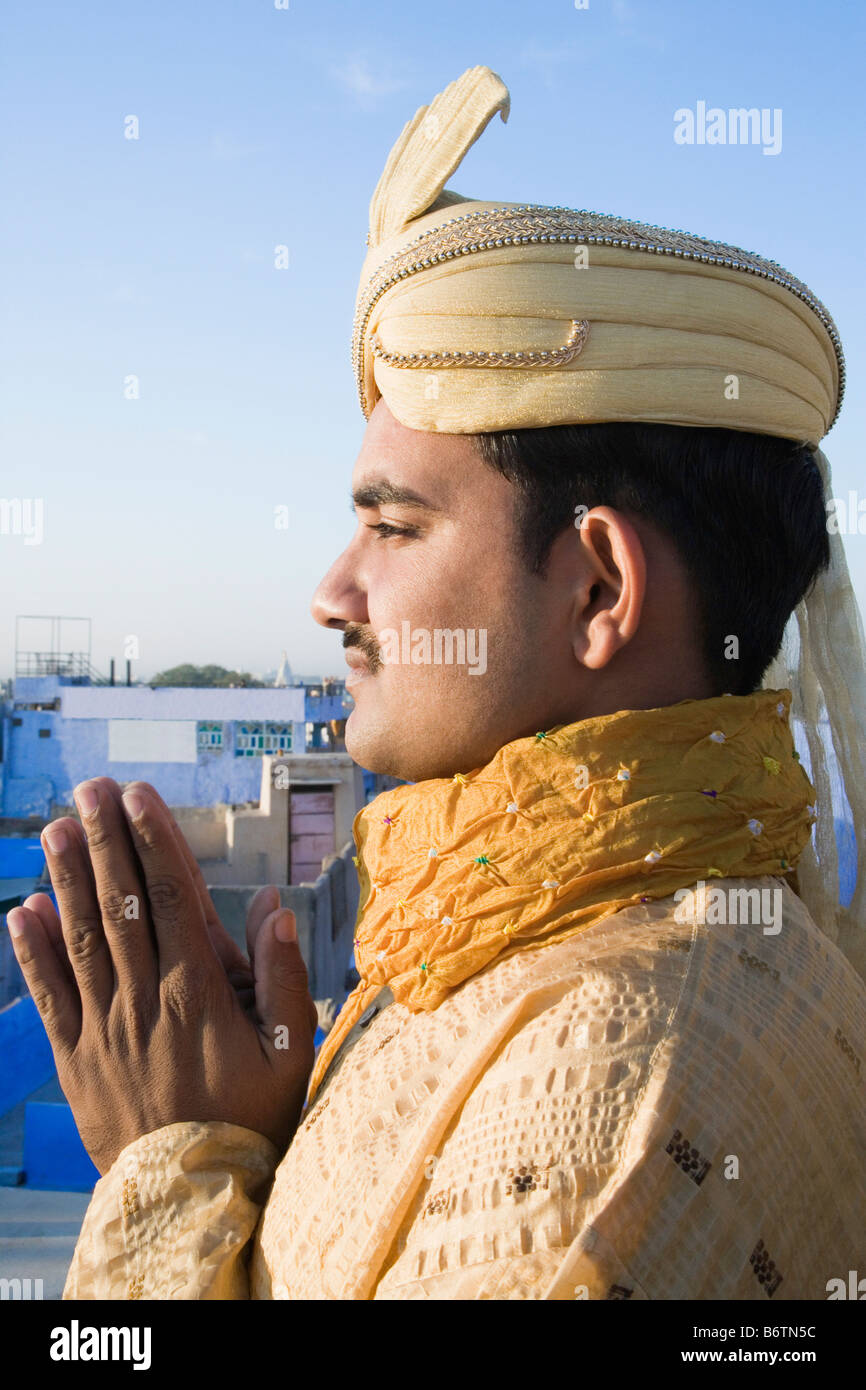 Side profile of a groom in prayer position, Jodhpur, Rajasthan, India Stock Photo