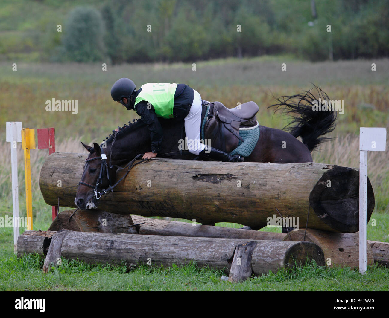Rider falls from horse rearing up at Moscow horse trials Stock Photo