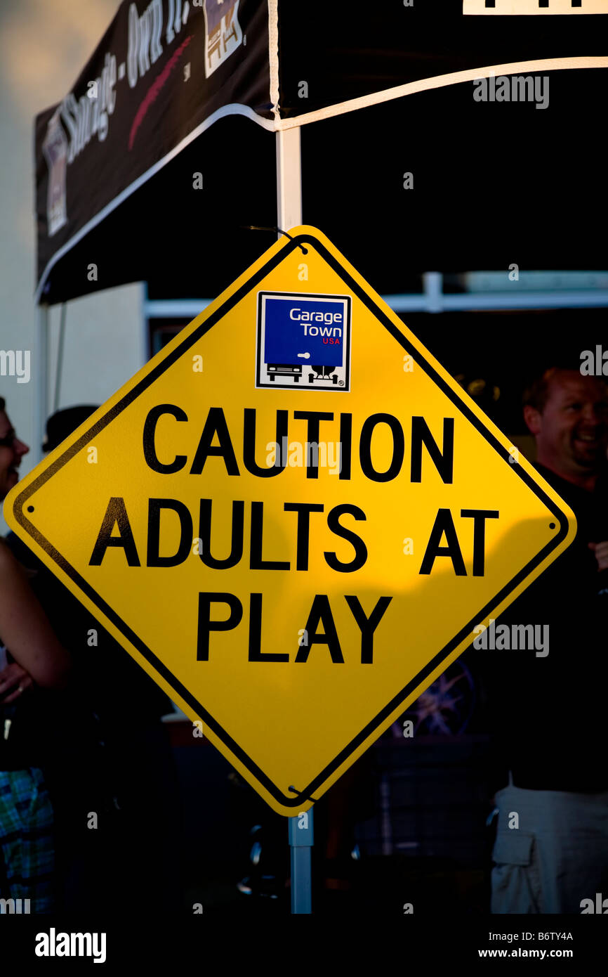 Yellow notice cautioning adults at play, displayed during Hot Rod