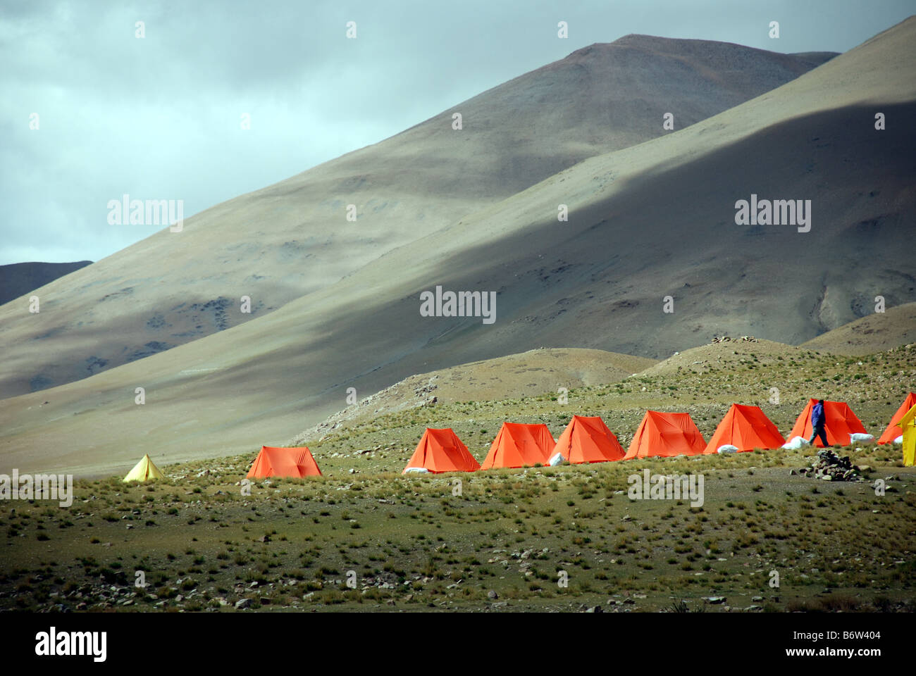 T tents in a trekking camp in Rongbuk valley of Tibet with snow covered