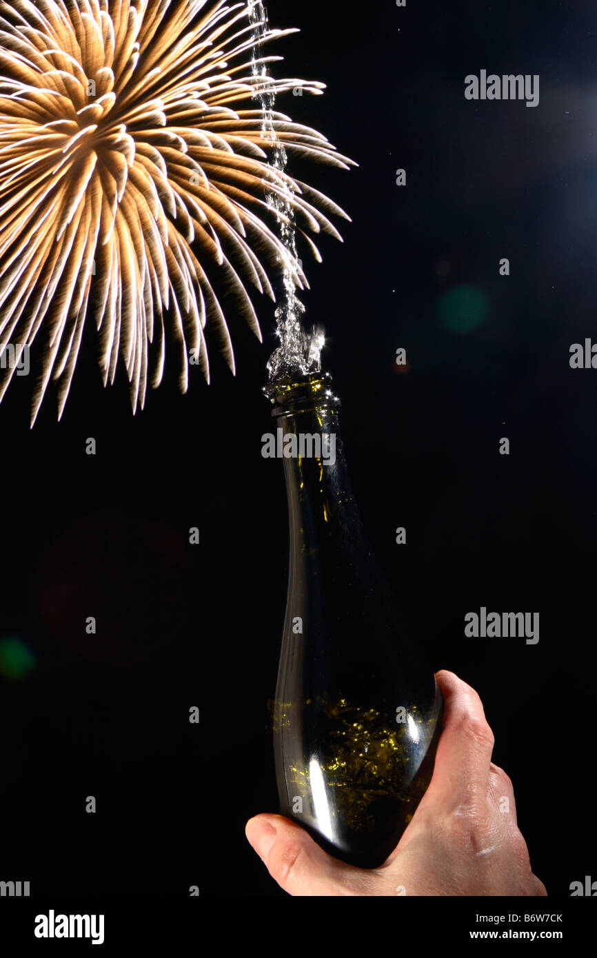 Celebration, Champagne Bottle with Fireworks. Stock Photo