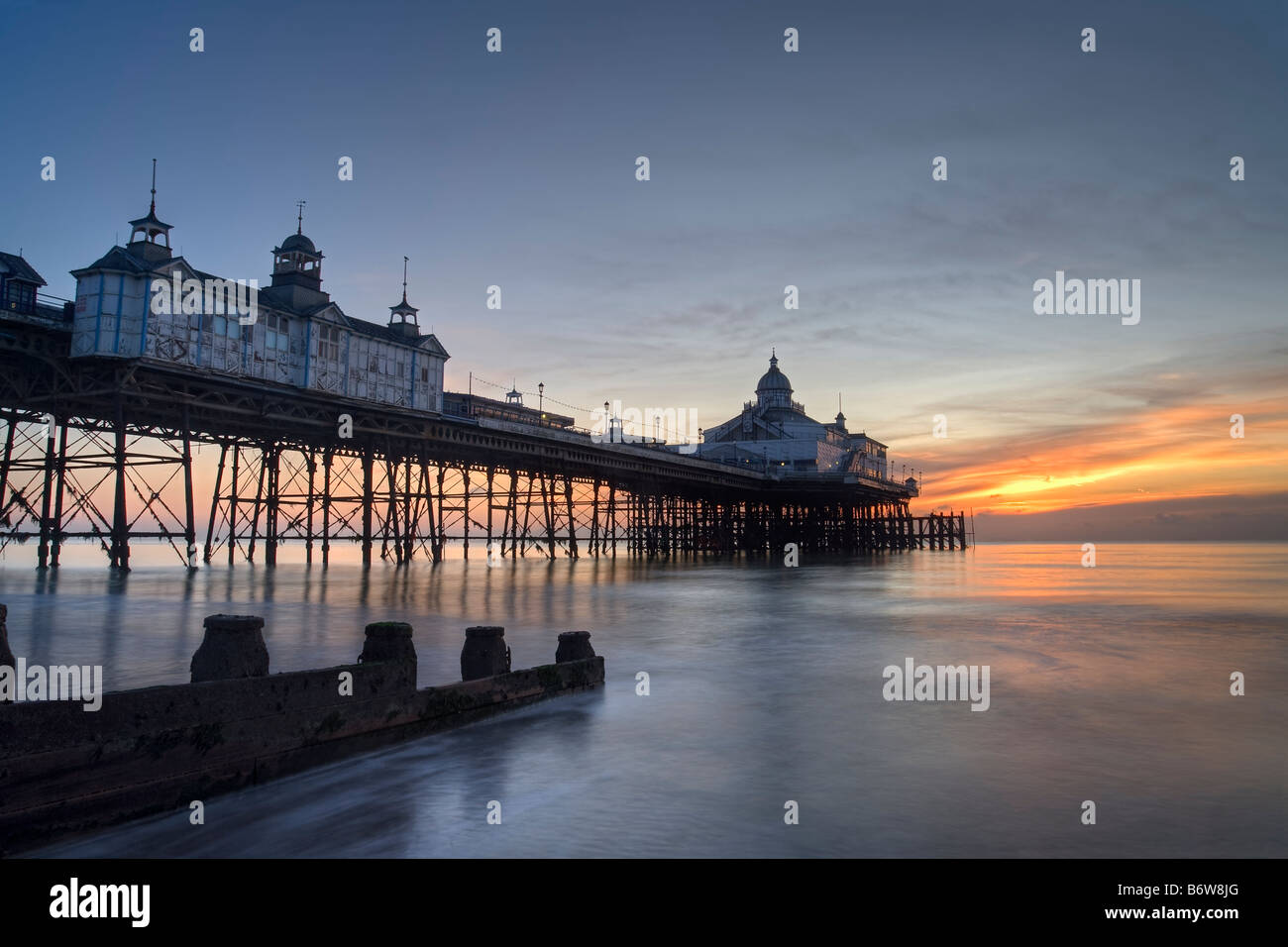 Eastbourne's victorian pier photographed during a winter sunrise from the seafront promenade Stock Photo