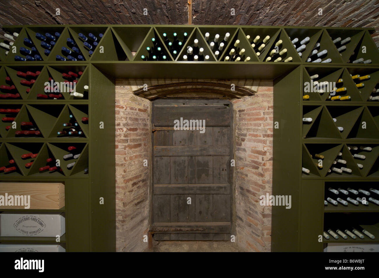 Doorway into wine cellar in English Country House Stock Photo