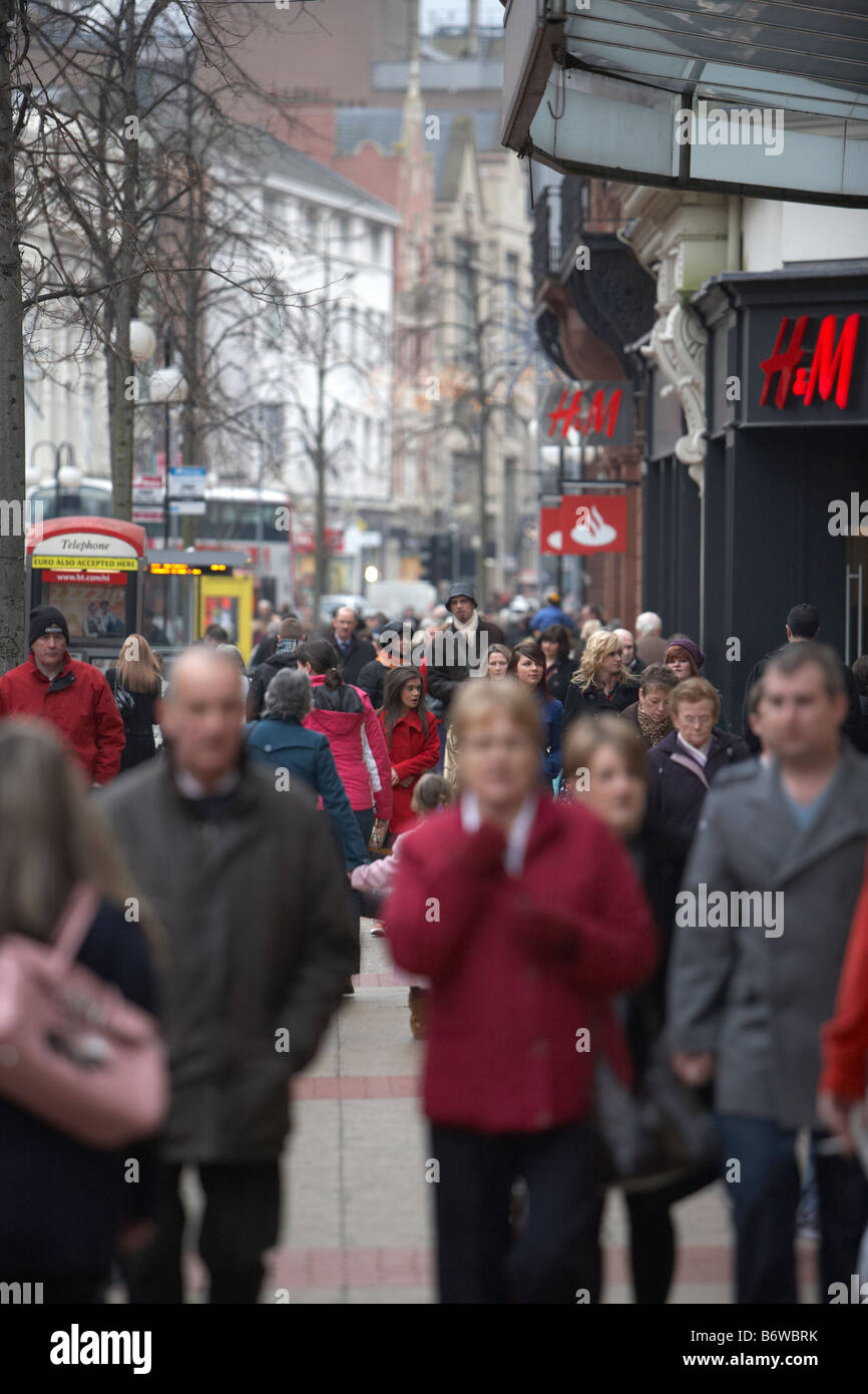 people walking along royal avenue belfast during the january sales but not carrying any shopping bags Stock Photo