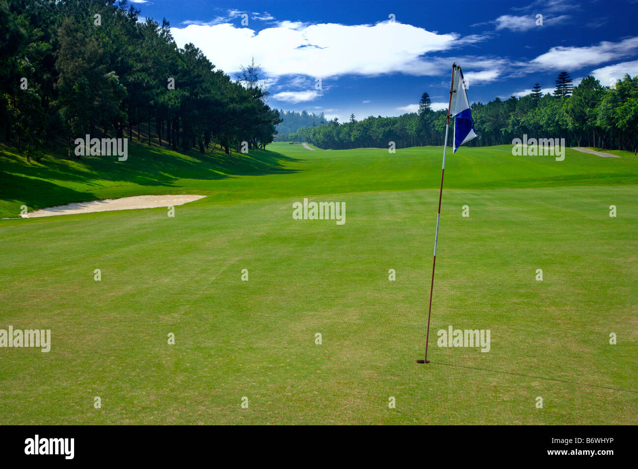 Flag in golf course Stock Photo - Alamy