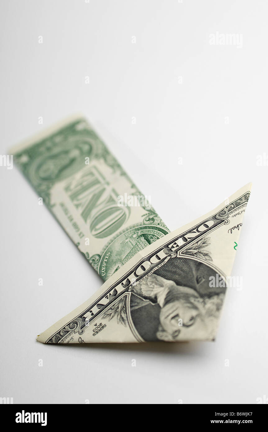 Arrow Made of Money Stock Photo