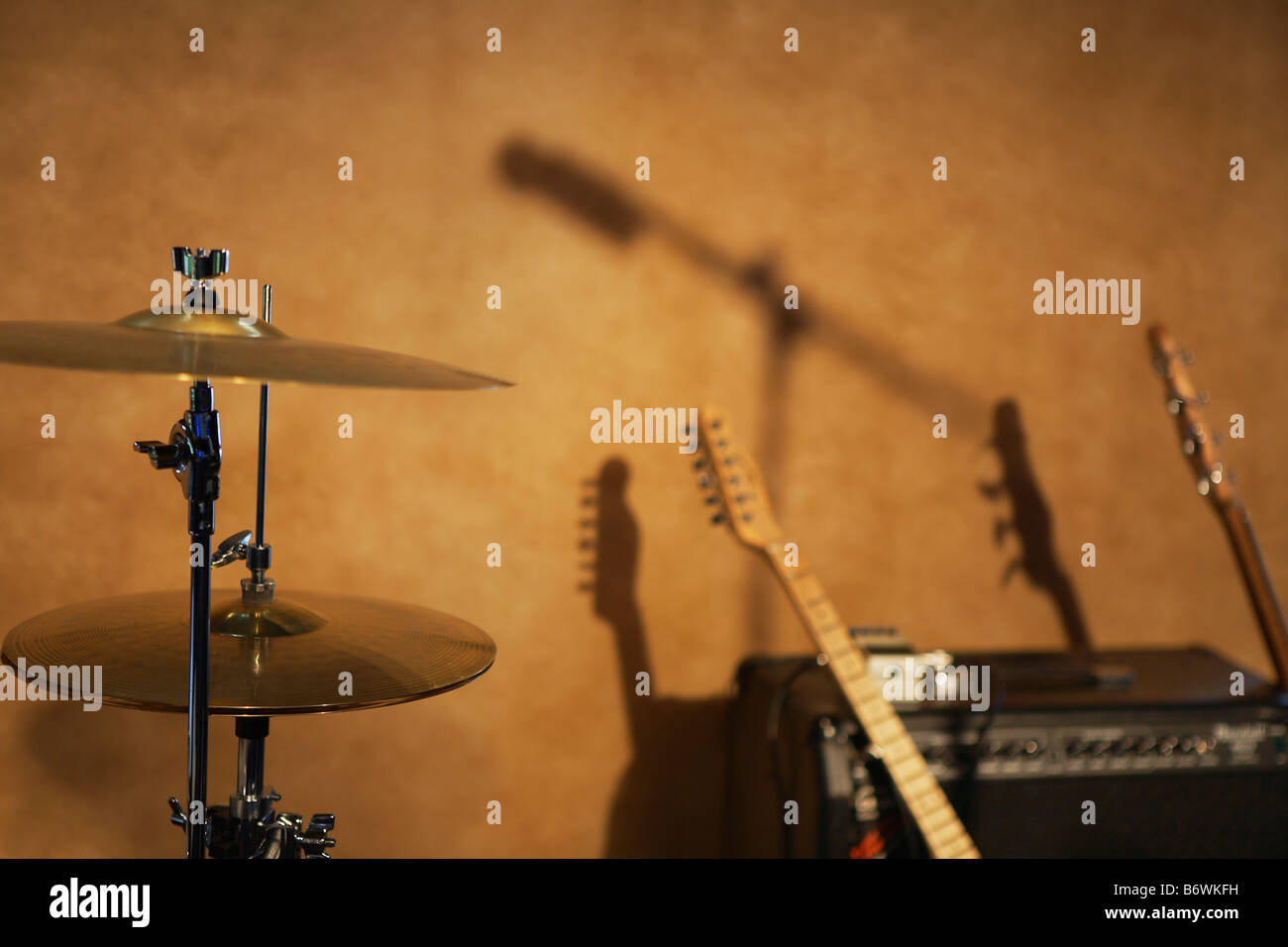 Drum Cymbals and Guitars by Amplifier Stock Photo Alamy