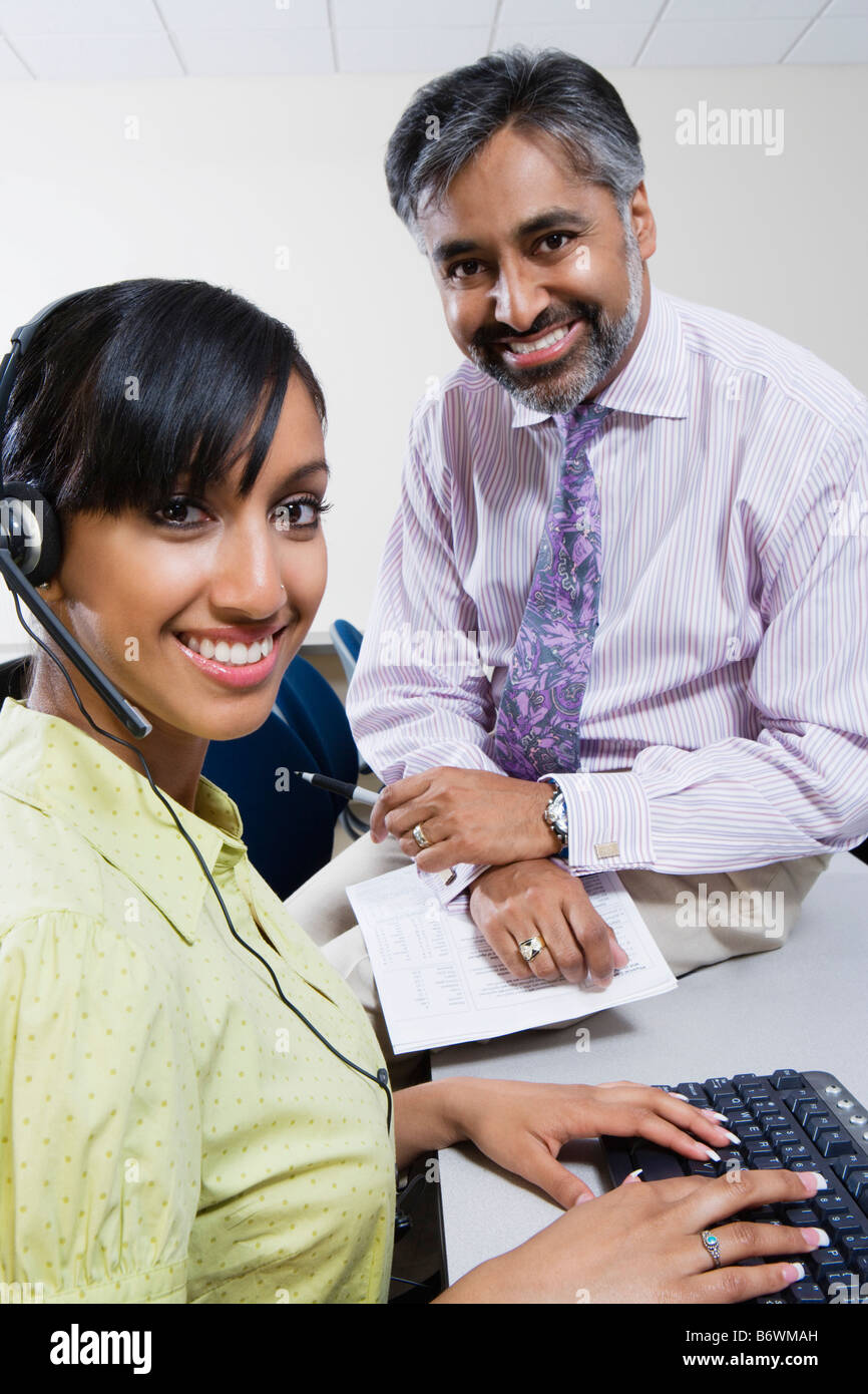 Two customer service representatives hi-res stock photography and ...