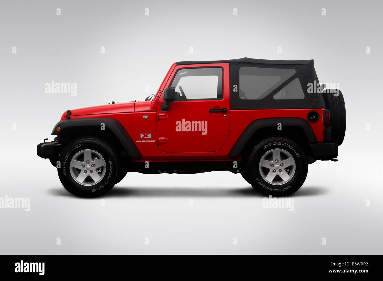 2009 Jeep Wrangler X in Red - Drivers Side Profile Stock Photo - Alamy