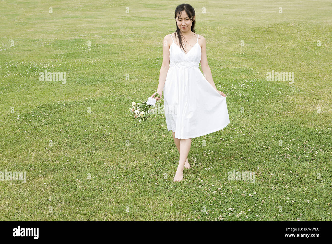 Walking barefoot grass asian hi-res stock photography and images - Alamy