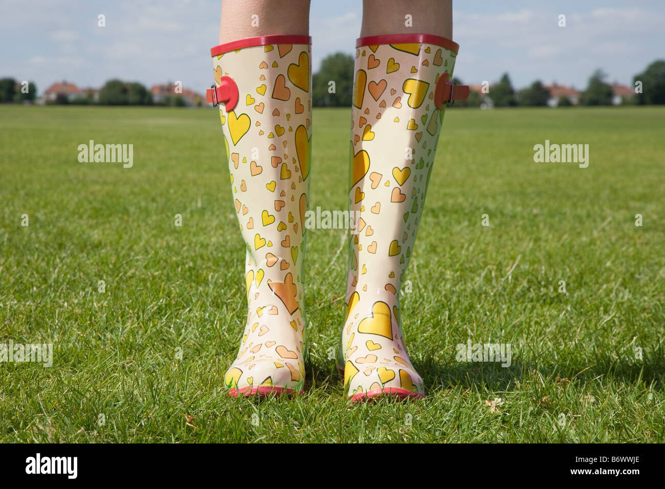 Person wearing rubber boots Stock Photo Alamy
