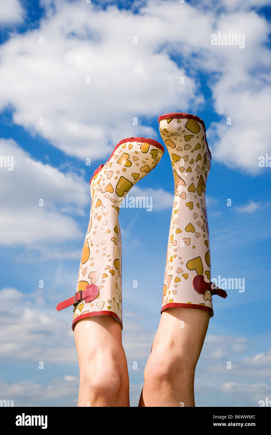 Person wearing rubber boots Stock Photo Alamy