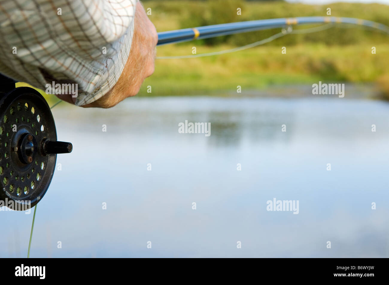 UK, Wales, Conwy. Trout fishing at a hill lake in North Wales (MR Stock