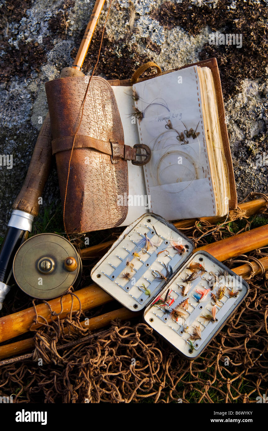 UK, Wales, Conwy. A split-cane fly rod and traditional fly-fishing equipment beside a trout lake in North Wales Stock Photo