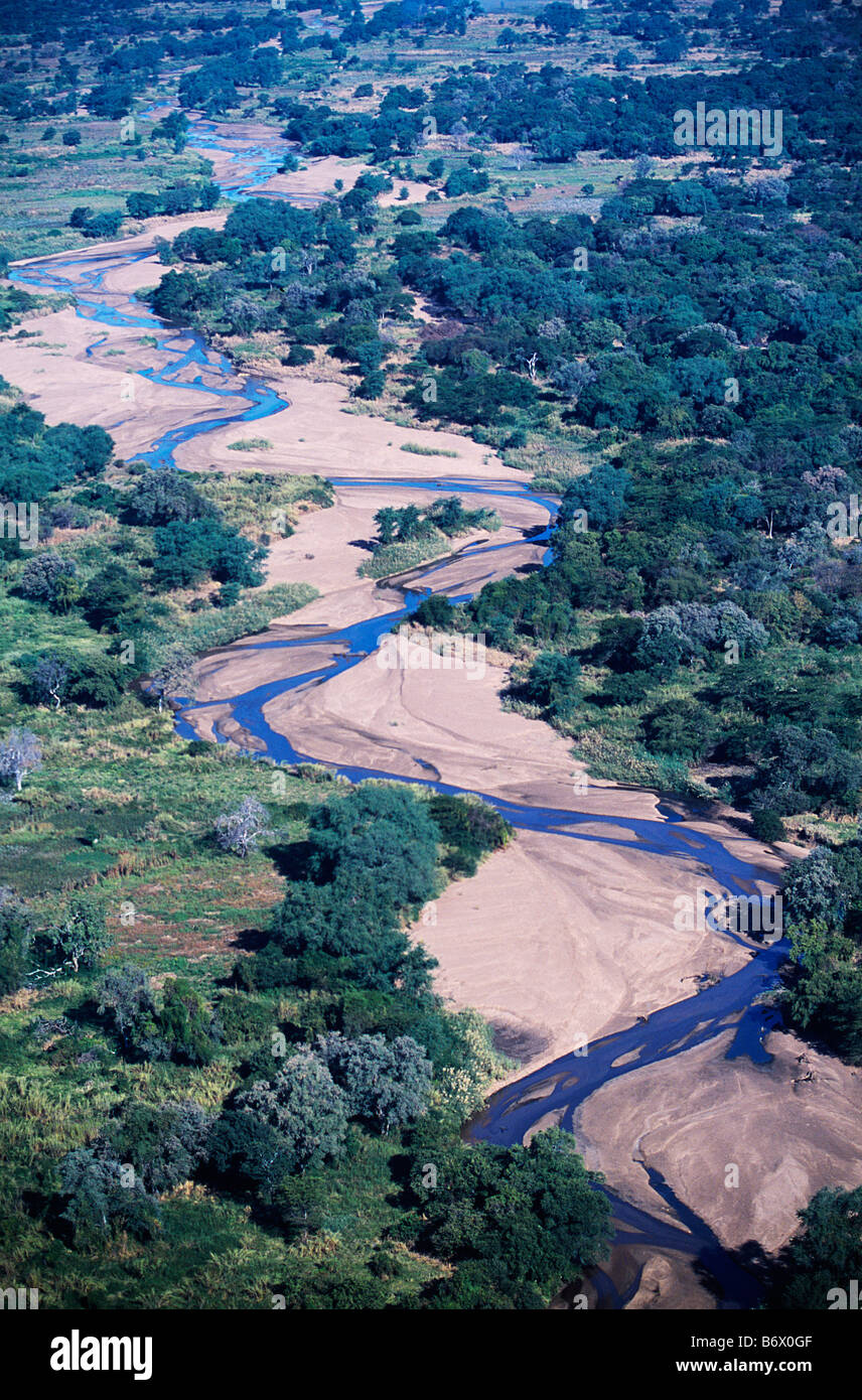 Zambia. Aerial view of the weaving course of a tributary of the Zambezi ...