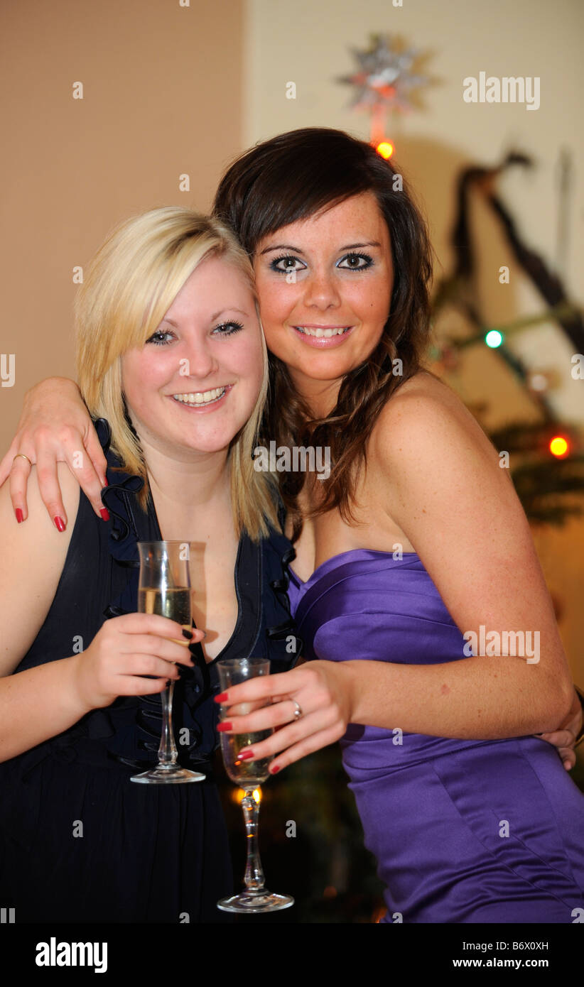 Party girls drinking sparkling wine for a night out Stock Photo