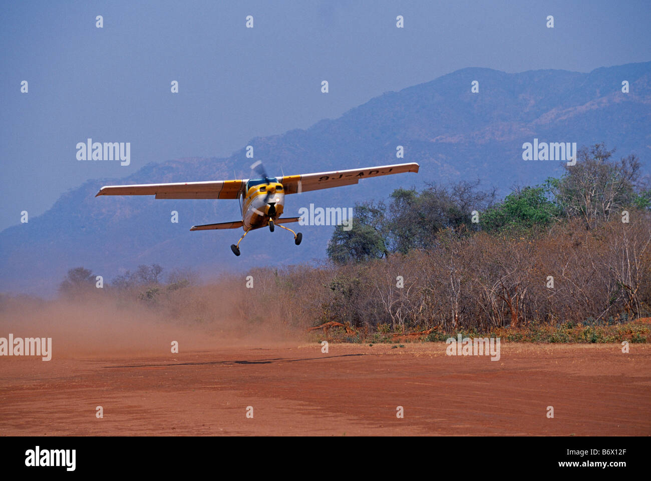 Zambia,  Lower Zambezi National Park. Bush plane taking off from Royal Livingstone airstrip. Stock Photo