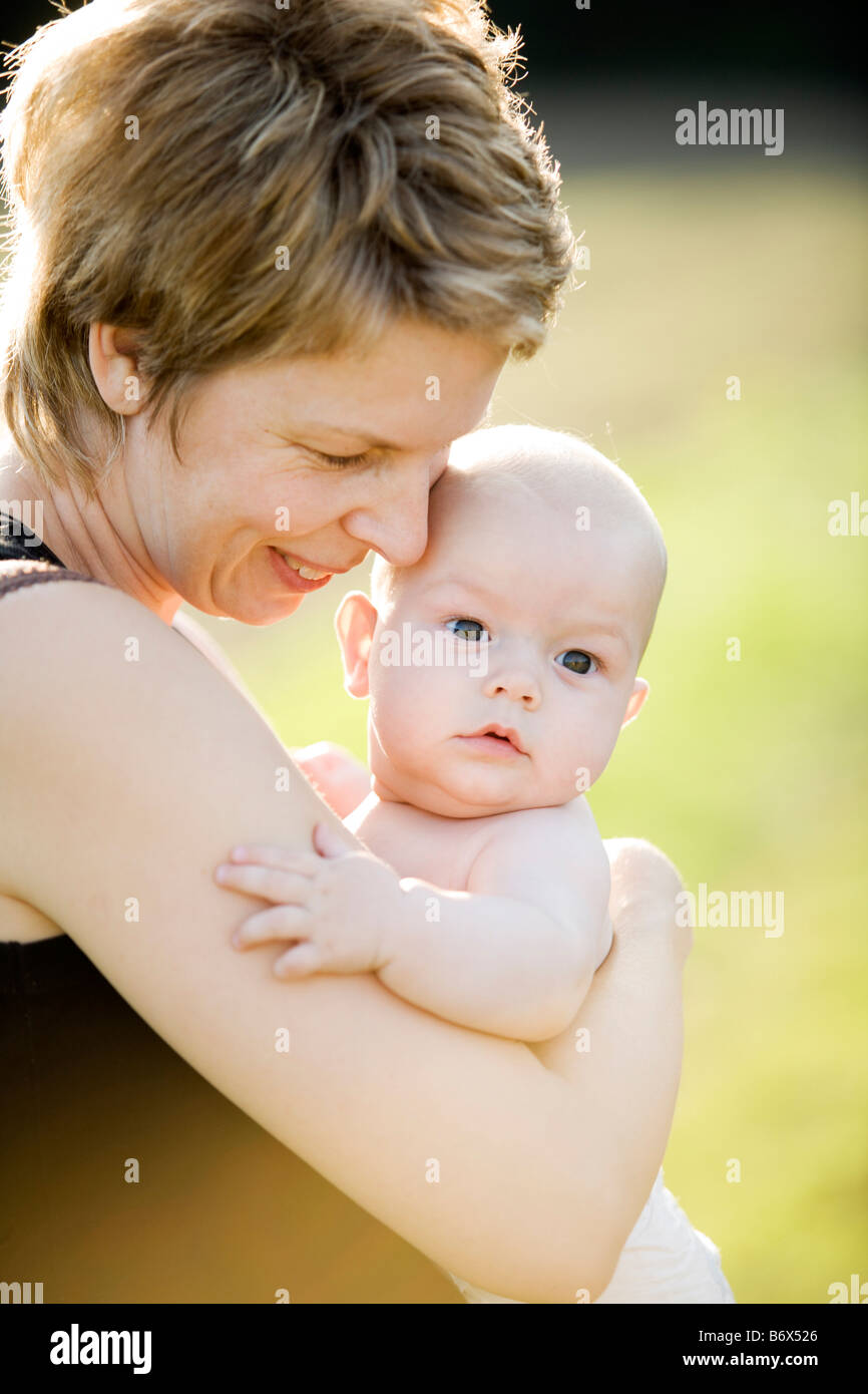 mother with a baby in her arms Stock Photo