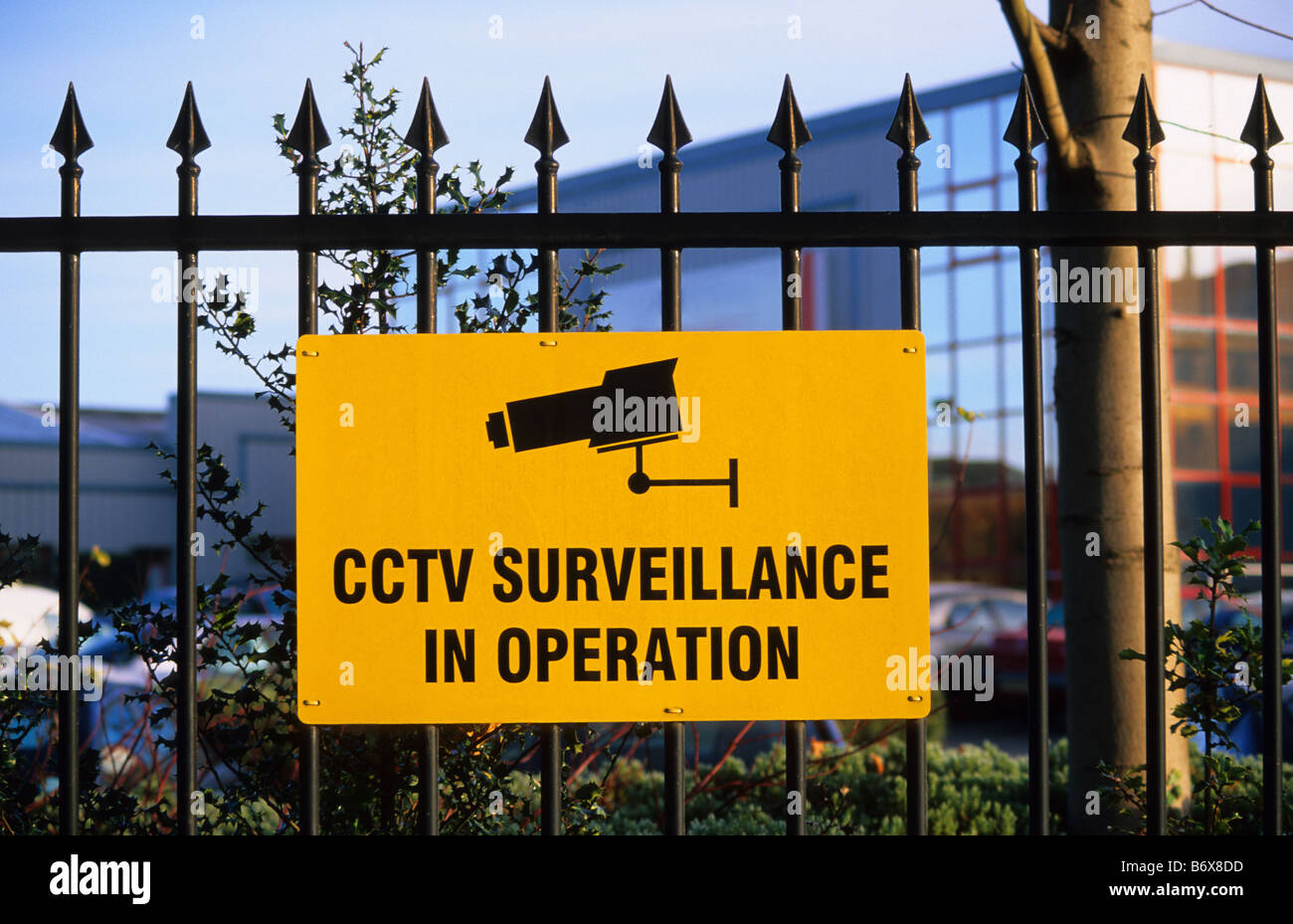 warning sign of close circuit television cameras at business premises on industrial estate UK Stock Photo