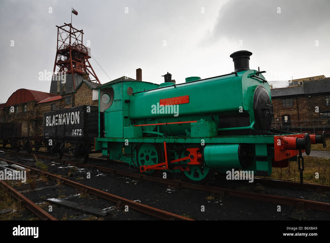 A steam shunter and the pithead winding gear at Big Pit National Mining Museum of Wales, Blaenafon, South Wales Stock Photo