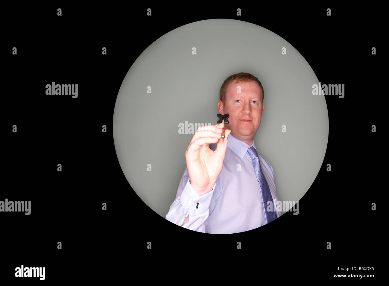 Man throwing dart Stock Photo Alamy