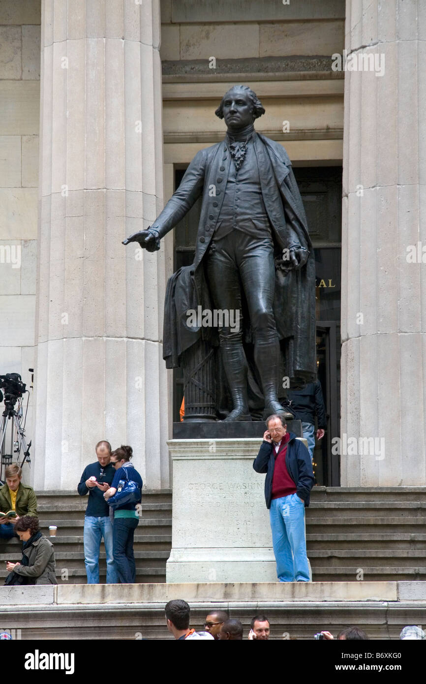 George Washington statue in front of the Federal Hall located at 26 Wall Street in New York City New York USA Stock Photo