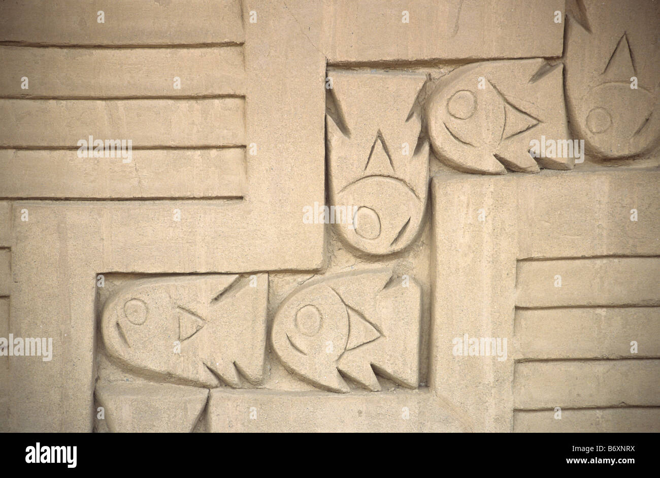 Detail of adobe frieze of fish figures in Corridor of Fish and Birds, Tschudi Palace, Chan Chan, near Trujillo, Peru Stock Photo
