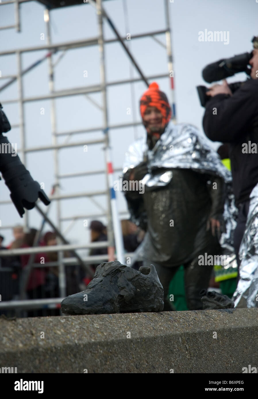 a lost muddy shoe from the 2009 maldon mud race Stock Photo Alamy