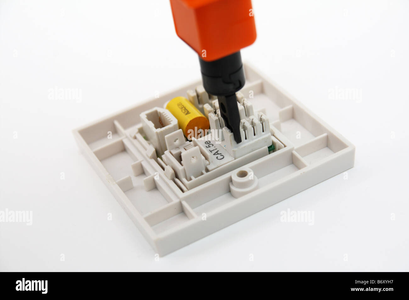Punchdown tool on RJ45 wall socket Stock Photo Alamy